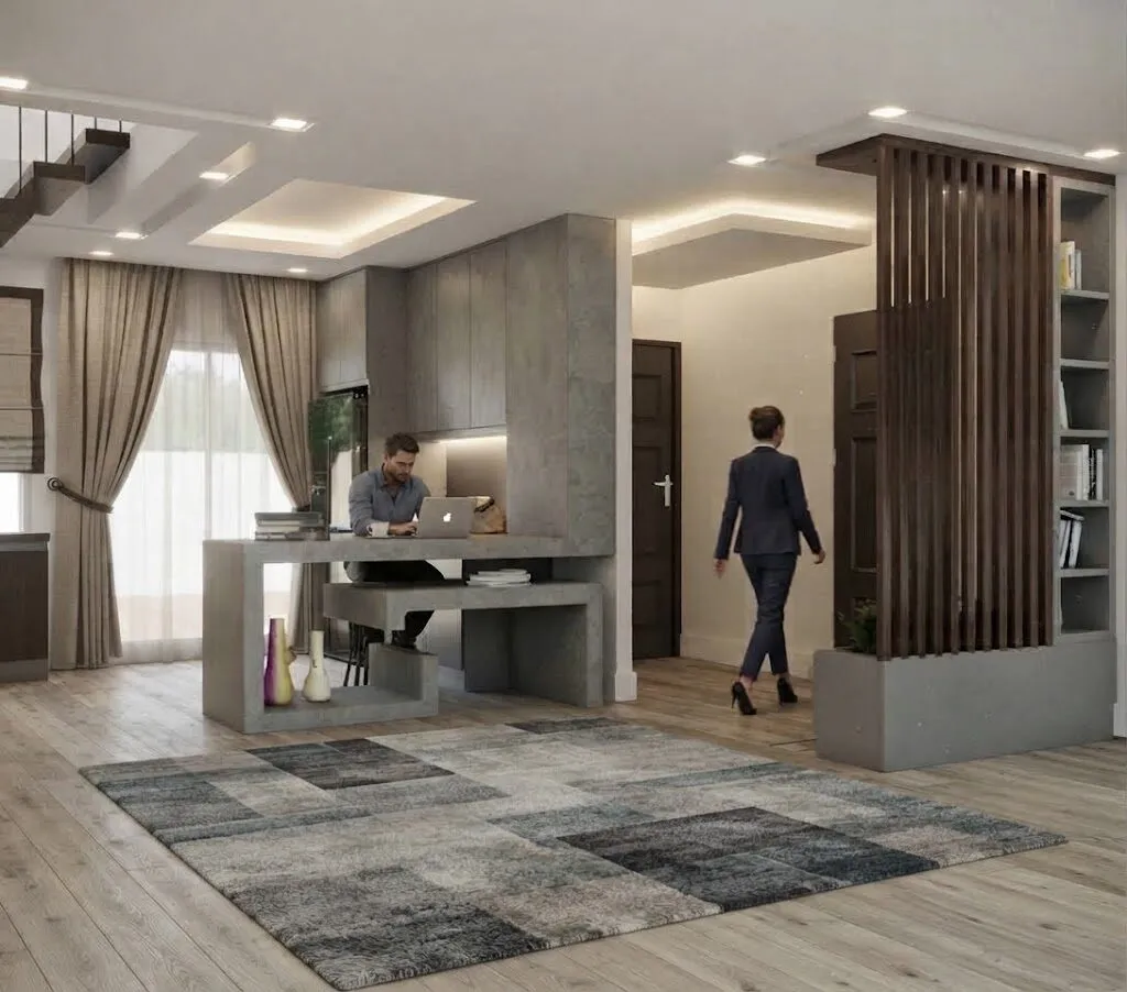 Home office with a concrete-finish desk, layered ceiling and timber slat column.